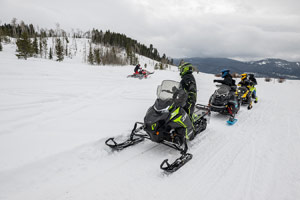 Take a Friend Snowmobiling