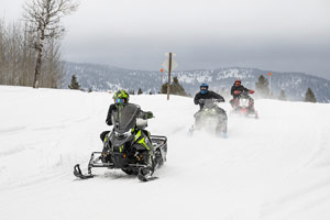 Take a Friend Snowmobiling