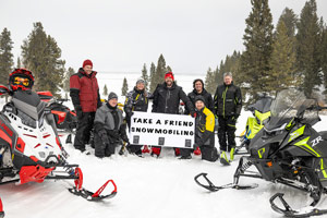 Take a Friend Snowmobiling