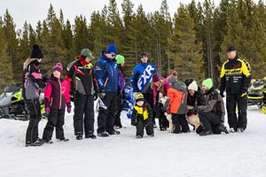 Snowmobilers in groups