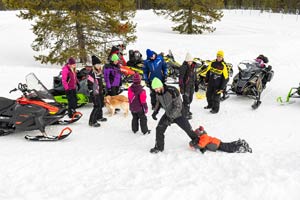 Snowmobilers in groups