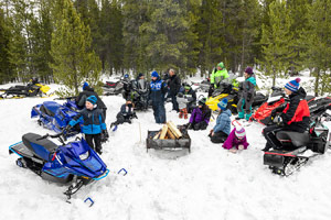 Photo of groups of snowmobilers